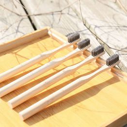  Customized hotel bamboo toothbrush with charcoal bristle manufacture by bamboo toothbrush factory with competitive price